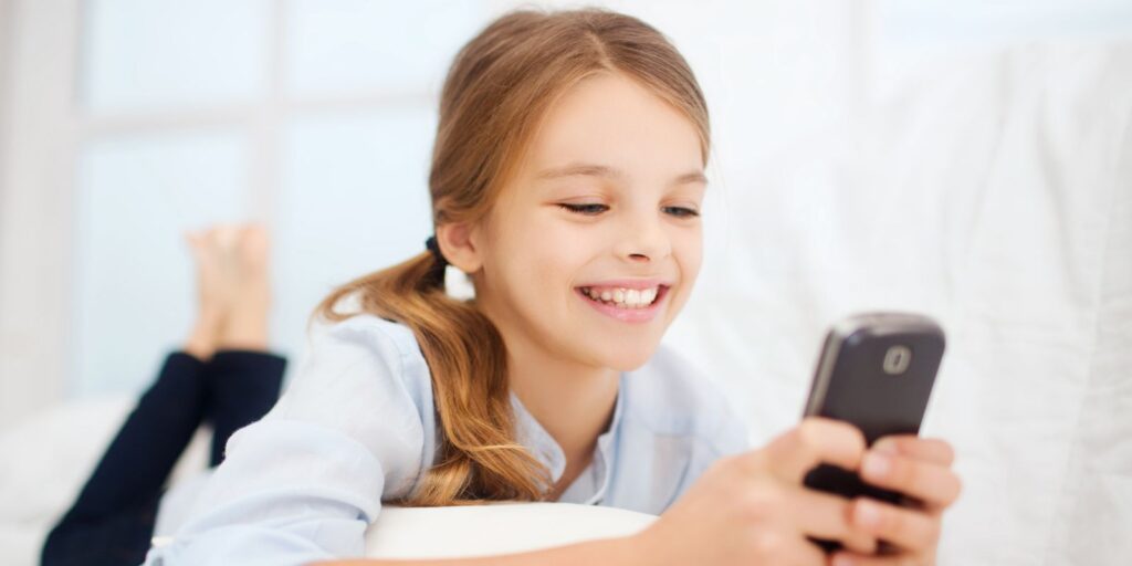 A child look at their phone