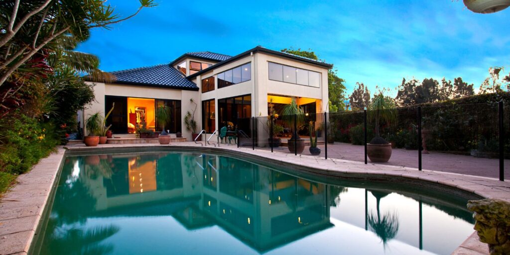 a large home with a pool