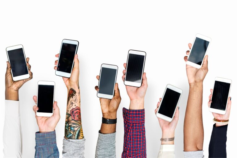Hands holding mobile phones